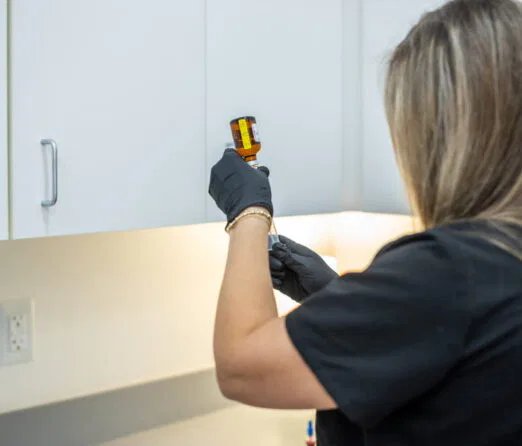 Lady preparing NAD+ Therapy