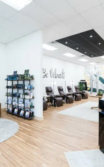 room of relaxing comfortable chairs next to IV drip holders